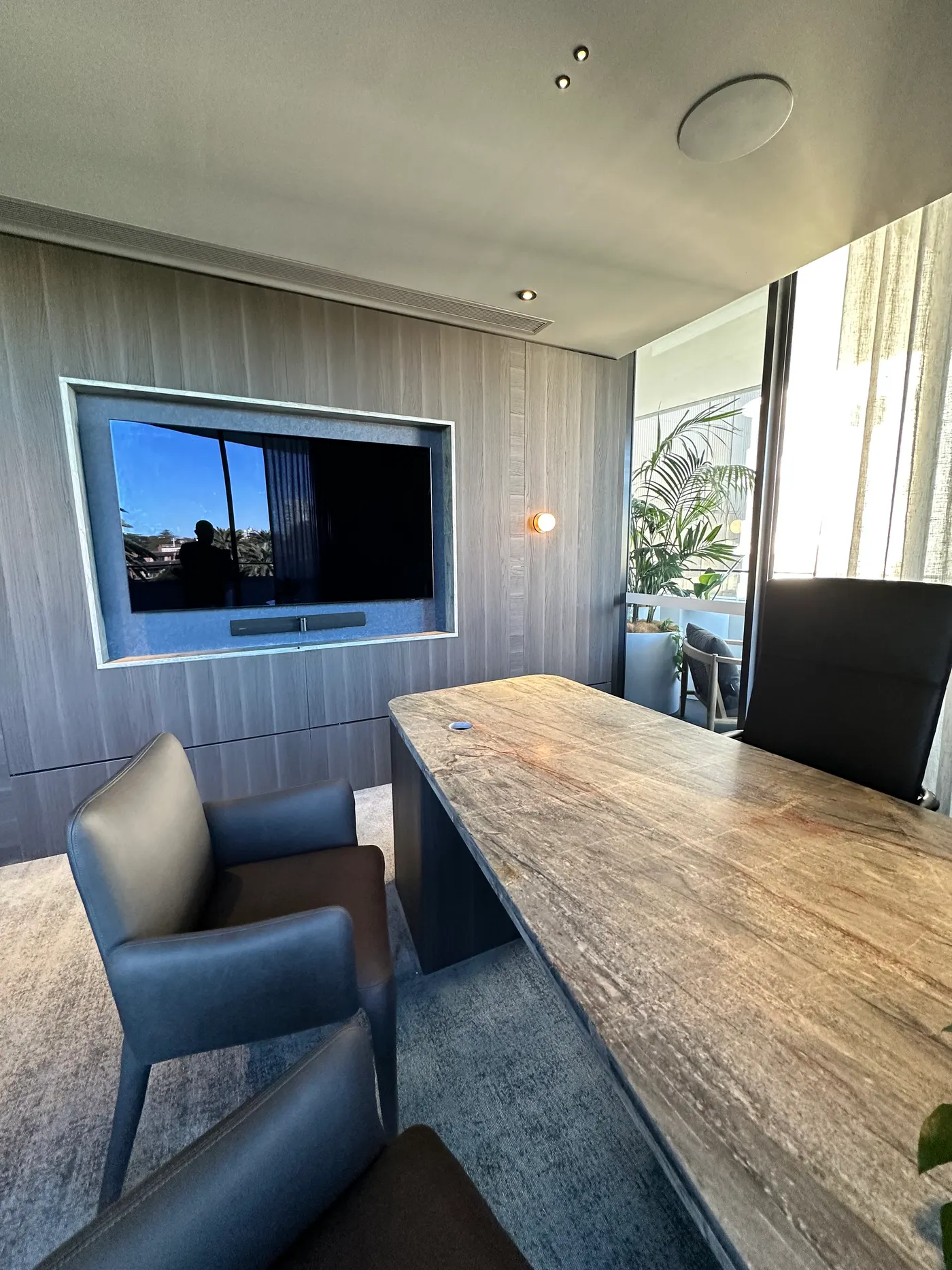 Highland Real Estate – Caringbah — integrated TV joinery in a timber-panelled wall by VBP Interiors